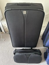 Black large Tripp suitcase &
